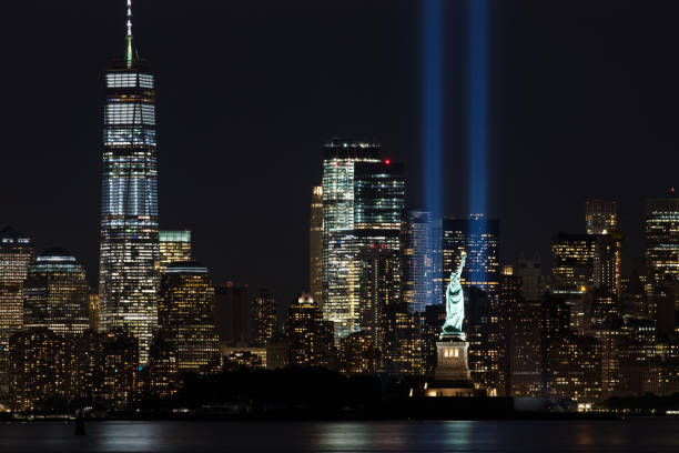 istock 9/11 Memorial Beacons with Statue of Liberty Lower Manhattan 853771654