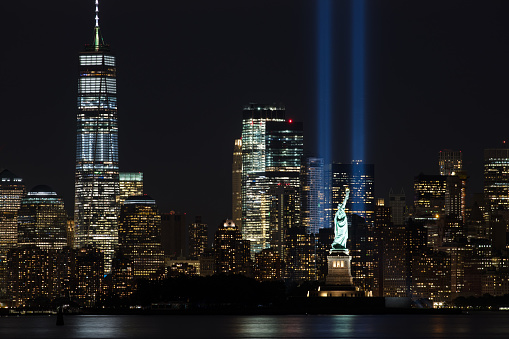 The Tribute in Light 9/11 memorial shot from Brooklyn Bridge Park. New York City