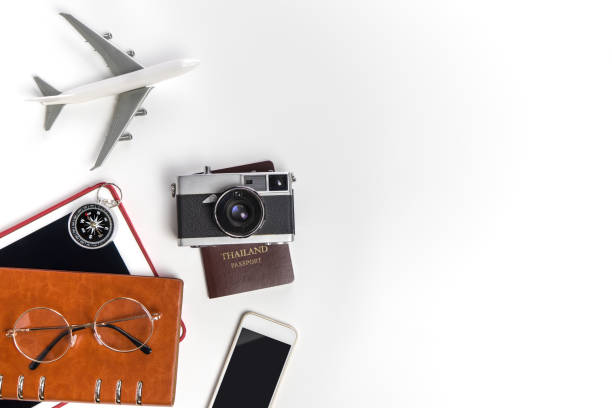 istock Business travel and transportation objects on white copy space background 853772350