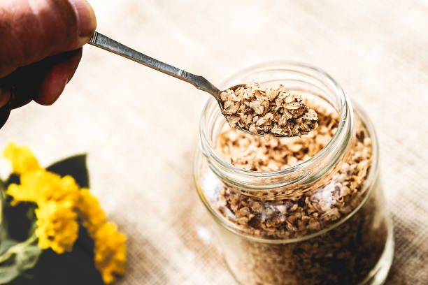 Buckwheat flakes in glass jar