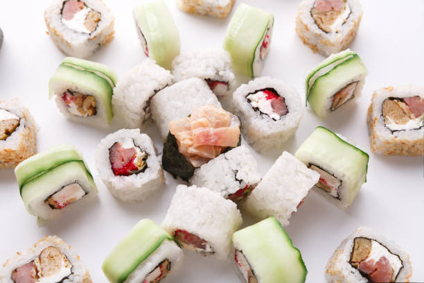 istock Set of sushi, maki and rolls isolated on white background 853784618