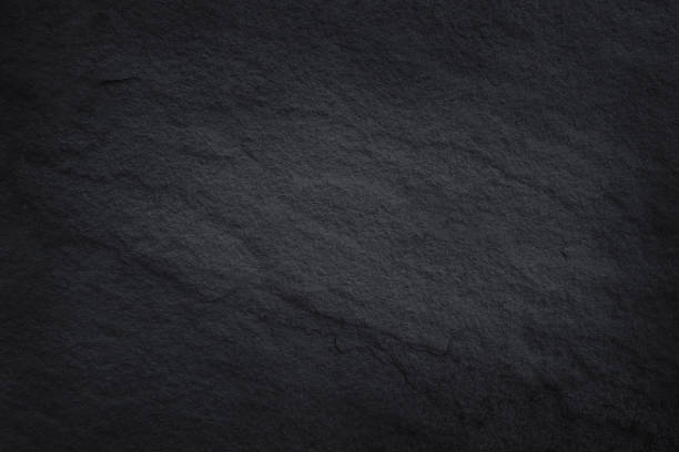 istock Dark brown slate texture in natural pattern with high resolution for background and design art work. Brown stone wall. 853798186