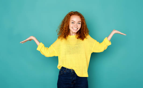 istock Young smiling woman with arms out 853805074