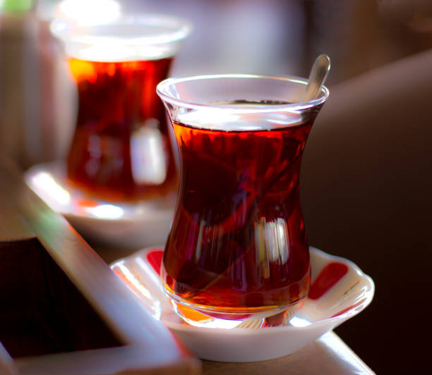 istock Black herbal turkish tea in the traditional glass 853812726