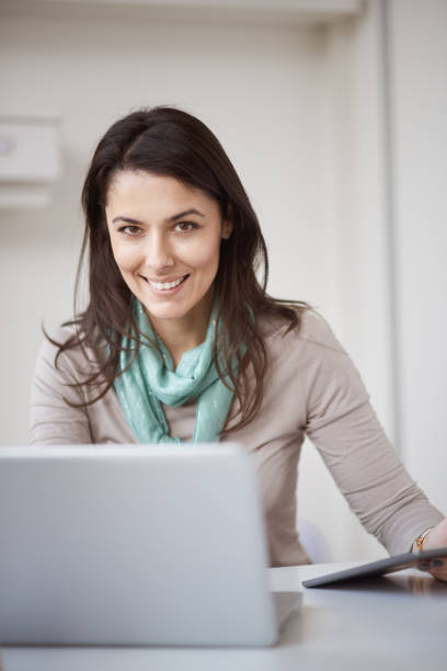 istock Caucasian woman working at home office 853812764