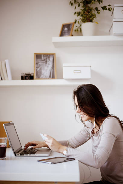 istock Caucasian woman working at home office 853812868