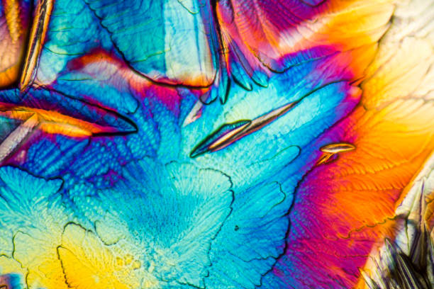 microscopic Galactose crystals microscopic Galactose crystals illuminated with polarized light oligosaccharide stock pictures, royalty-free photos & images