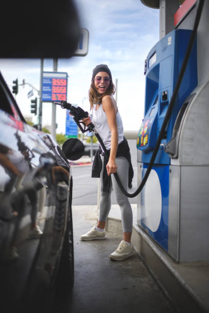 istock Woman at the gas station 853813452