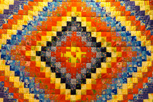 istock mottled background in patchwork fabrics of different colors 853818038