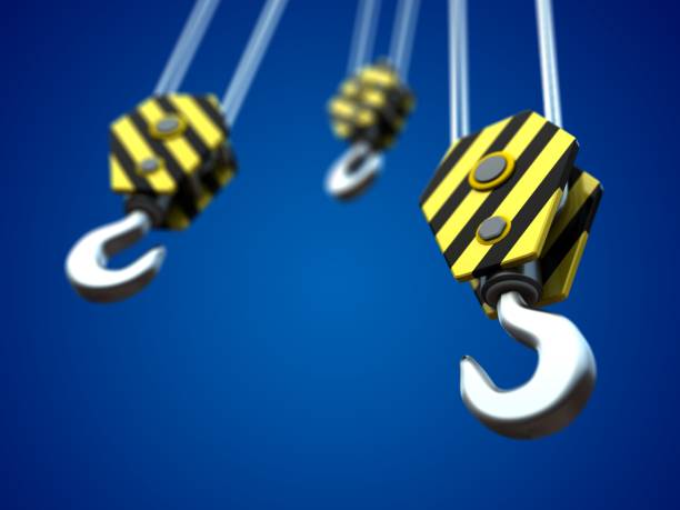 istock 3d of three crane hooks 853818860