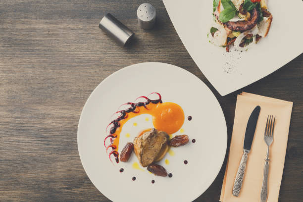 istock Roasted goose liver with date fruit and apple 853824948