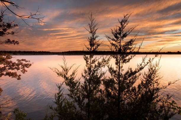 istock Cloudy Sunset at Fellows Lake, Springfield, Missouri 853827826