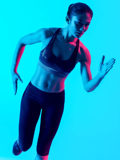 istock woman runner running   isolated 853828426