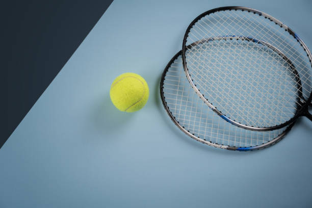 istock Badminton raket  with tennis balls top view. 853831800