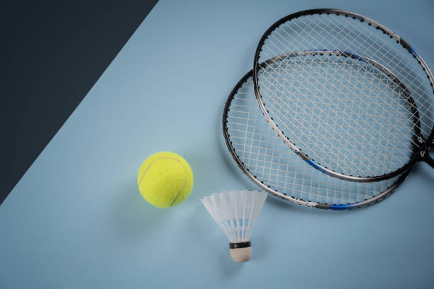 The girl playing badminton outdoors