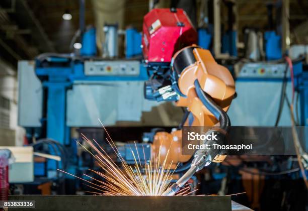 Robot Welding Assembly Car Part In Factory Stock Photo - Download Image Now - Arm, Auto Repair Shop, Automated