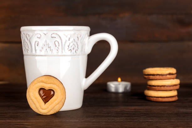 istock Cookies, hot chocolate, candle, and place for text 853839774