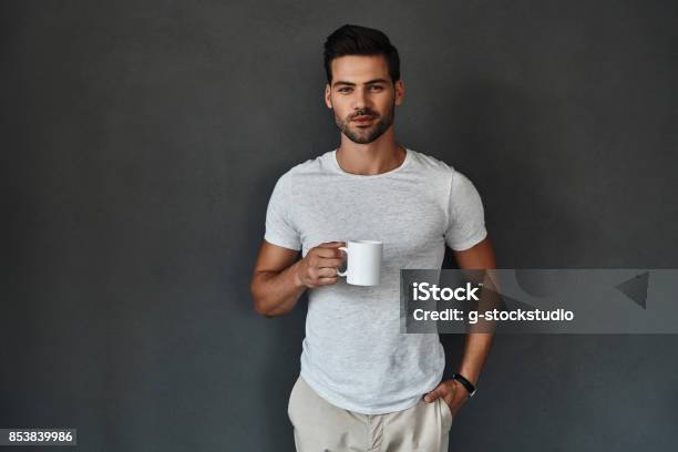 Enjoying Hot Tea Stock Photo - Download Image Now - Men, Fashion Model, Portrait