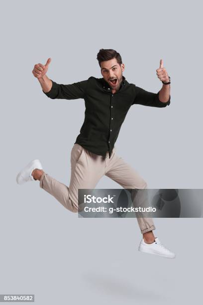 Man In Midair Stock Photo - Download Image Now - Jumping, Men, Full Length