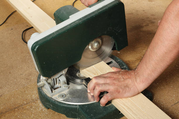 Building and repair - Work on the Miter saw Tools Building and repair - Work on the Electric Miter saw miter saw stock pictures, royalty-free photos & images