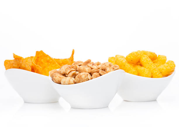 istock Cheese corn snacks and nachos with salty peanuts 853862602