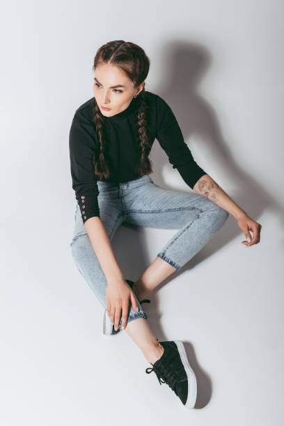 istock stylish young woman 853871762