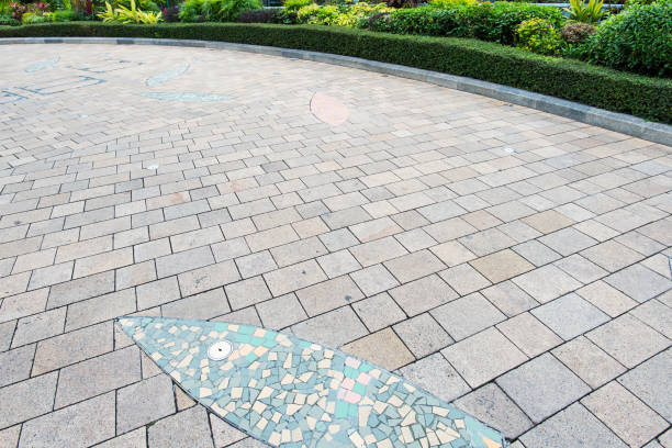 istock Stone brick footpath in tropical garden 853879178