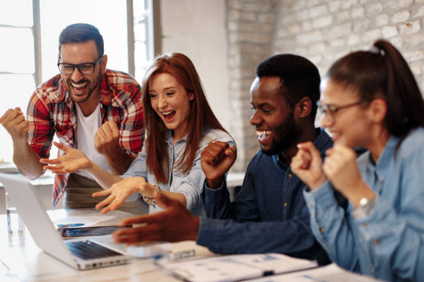 istock Good news young team in the office 853884086