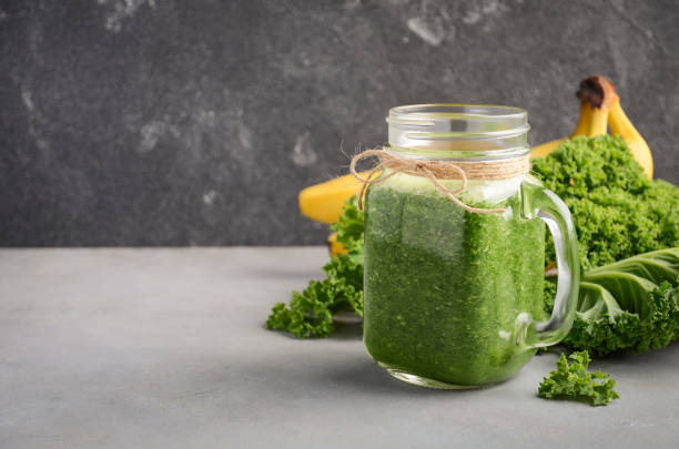 istock Fresh green smoothie with kale and banana. 853892570