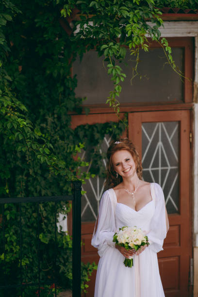 istock Portrait of a beautiful bride on wedding day 853892996