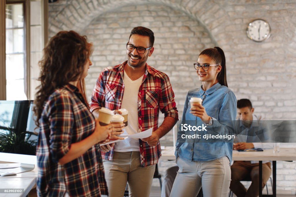 Young freelance team at a coffee break Coffee Break Stock Photo