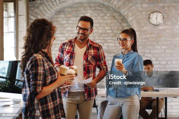 Young Freelance Team At A Coffee Break Stock Photo - Download Image Now - Coffee Break, Office, Coffee - Drink