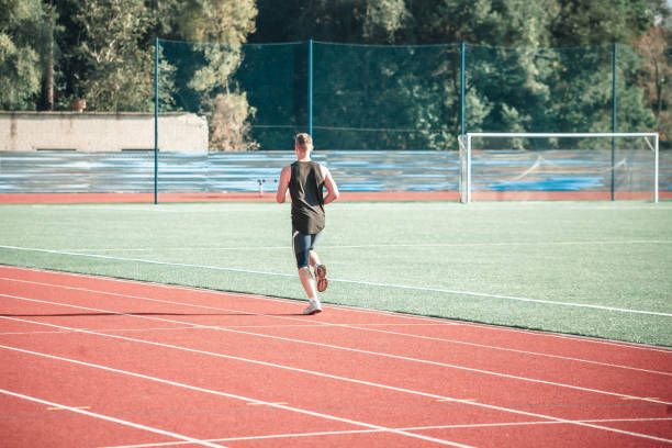 istock View from the back to the man on a run 853904466