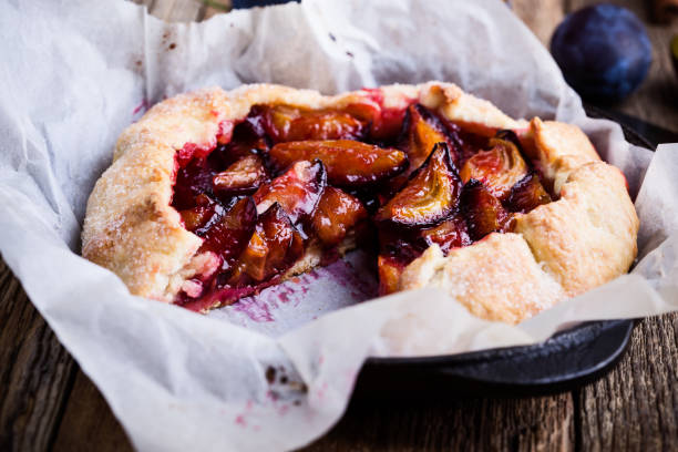istock Rustic plum tart in cast iron skillet 853904508