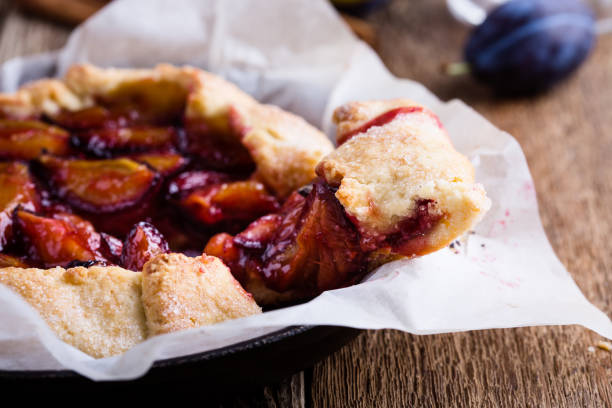 istock Homemade rustic plum tart in cast iron skillet 853906644