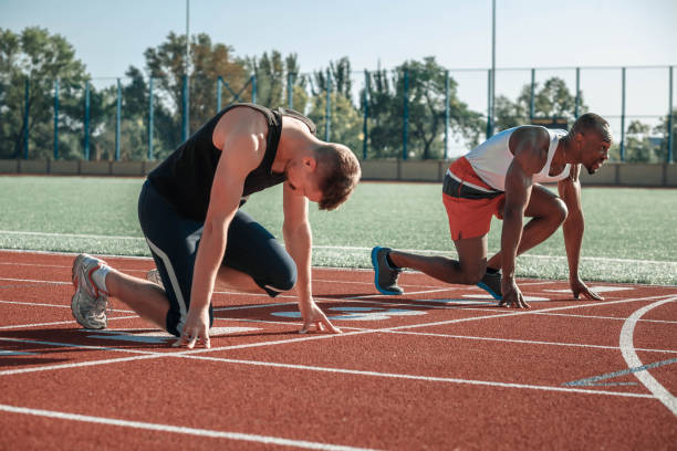 istock White and black male athletes are preparing to start 853907362