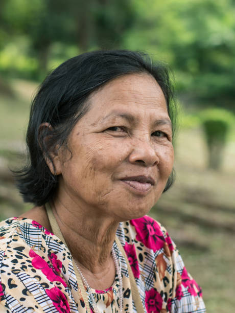 istock Close up old Thai woman portrait 853907496