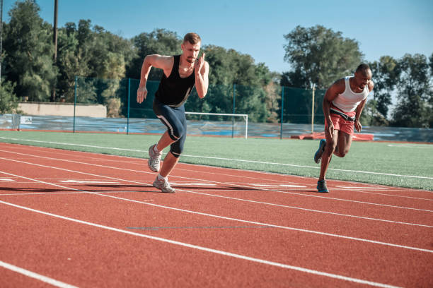 istock A pair of male athletes compete in running 853907948