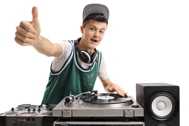 istock Teenage DJ playing music on a turntable 853908522