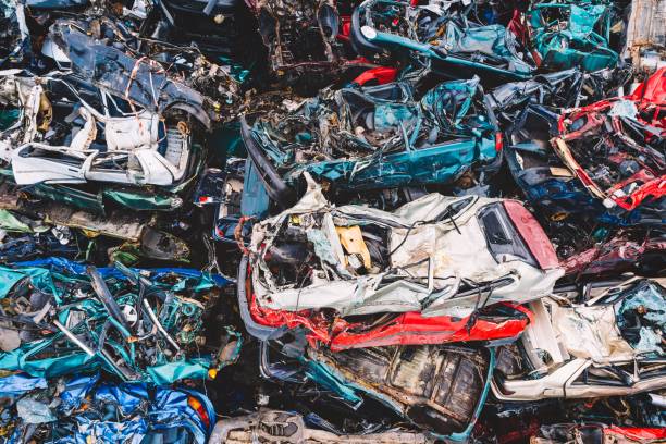 istock Scrapped cars stacked on a scrap yard. 853911772