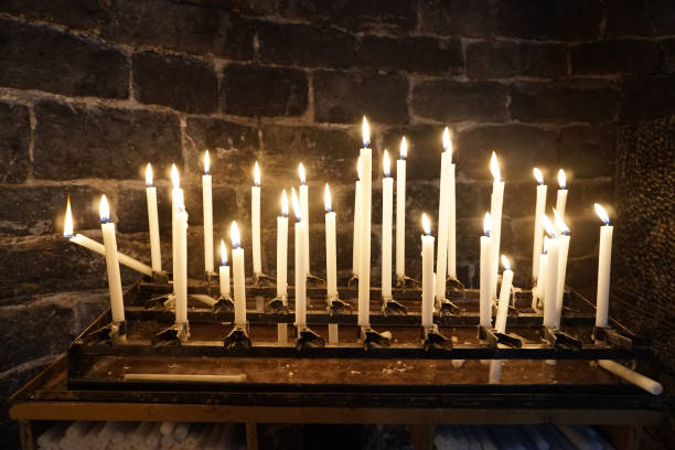 istock church votive candles white flames 853915422