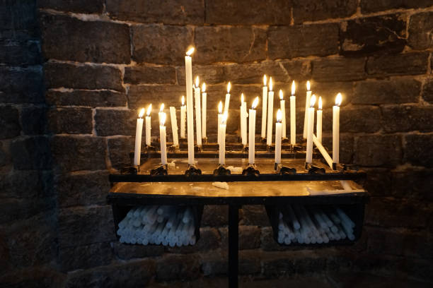 istock church votive candles white flames 853915724