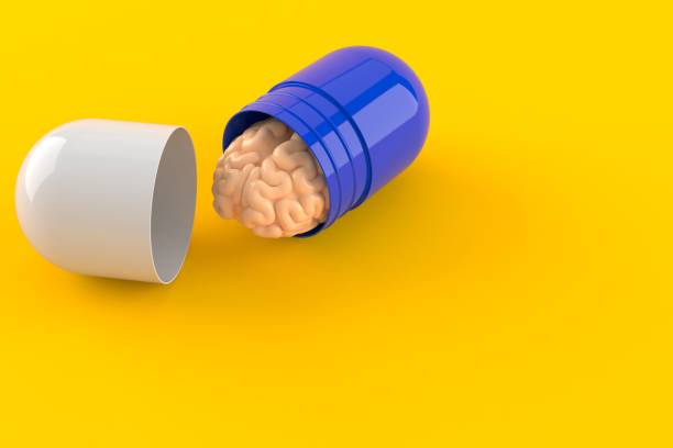 Brain with pill stock photo