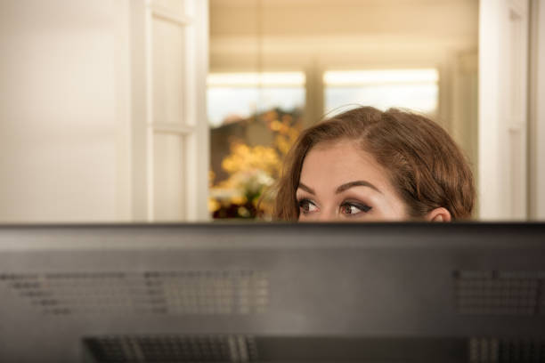 istock Woman with headset working from home 853919768