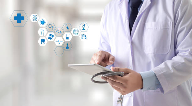 istock Medicine health care professional doctor  hand working with modern computer interface technology 853920216