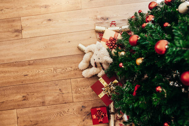 istock Gifts for Christmas placed beside a Christmas tree. 853923690