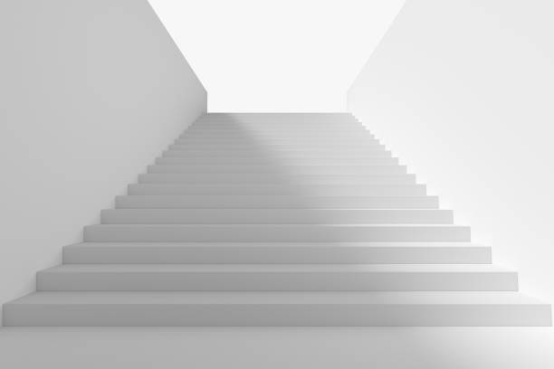 istock Long staircase in underground passage upward with big shadow 853926878
