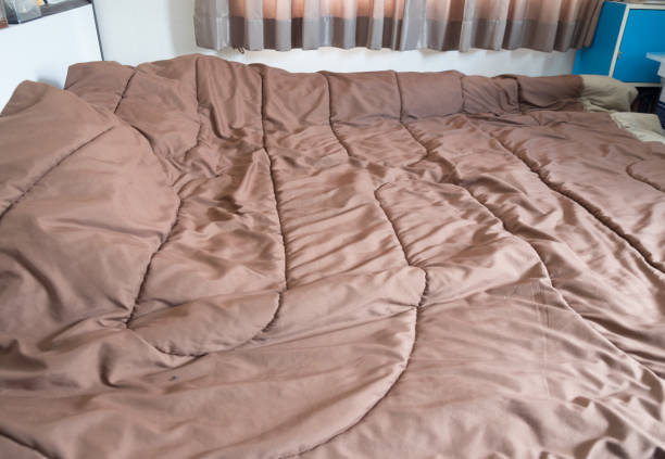 istock Brown color scheme bedding in home 853927750