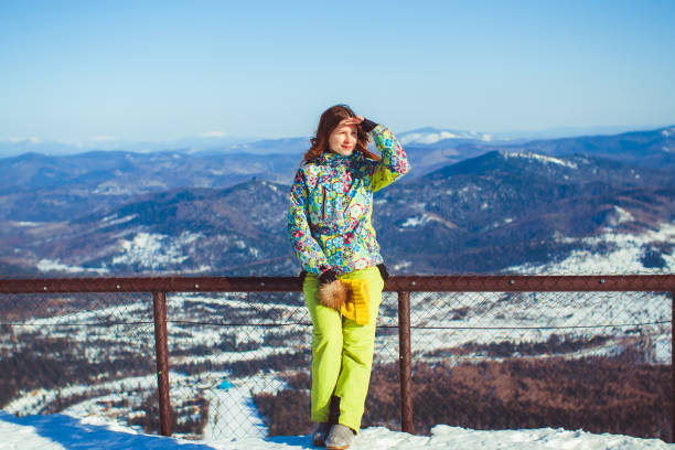 istock woman in winter mountains 853928198