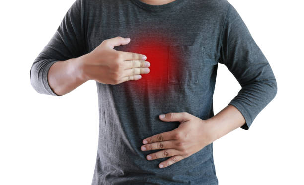 istock MAN with symptomatic acid reflux , suffering from acid reflux 853930714